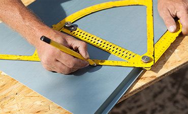 Close up of hands and tool